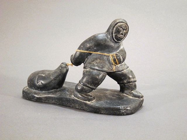 Pauloosie Weetaluktuk, Hunter dragging seal, c. 1960-1969
Stone,  sinew, 6 1/2 x 10 x 4 in. (16.5 x 25.4 x 10.2 cm)
SOLD
00066-1