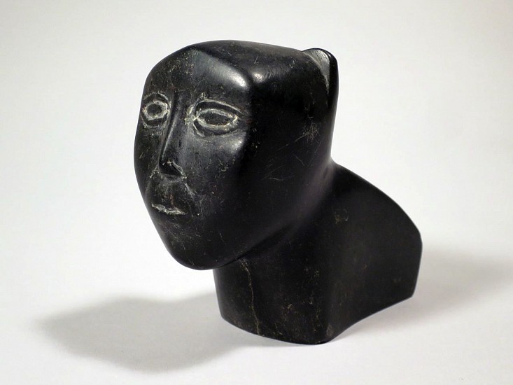 Audla Pee, Container in the form of a human-animal transformation, c. 1950-55
Stone, 4 x 2 x 5 1/4 in.
Provenance: Albrecht Collection of Arctic Art.  In the early 1950s, when the Canadian Government was anxious to help develop a market for Inuit Art, it sponsored a [somewhat ill-advised] pamphlet, "Eskimo Handicrafts" that depicted both some genuine Inuit art and artifacts, but that also included pictures of non-Inuit objects, such as ashtrays.  The purpose was to encourage the Inuit to produce similar objects. There is no other reasonable explanation for the inspiration for this altogether charming work -- a handsome human head with distinctly animal ears mounted on the front of a box suitable for business cards.  Audla Pee, the carver, went on to become a prominent Cape Dorset artist, carving more traditional subject matter.
03149-2