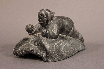 Work: Fisherman above fish