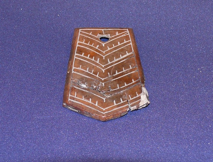 19th & 20th C Alaskan Anonymous, Pentagonal plaque with linear decoration, 19th century
00235-1