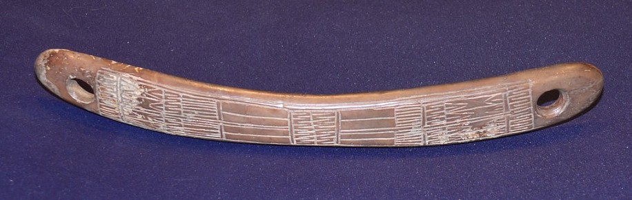 19th & 20th C Alaskan Anonymous, Wide bag handle with extensive geometric decoration, 19th century
00230-1