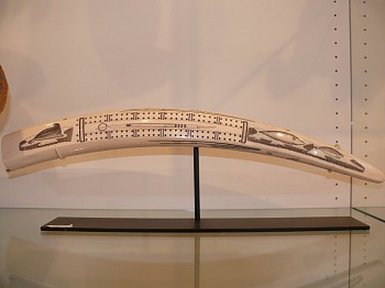 19th & 20th C Alaskan Anonymous - big cribbage board with marine mammals and harpoon