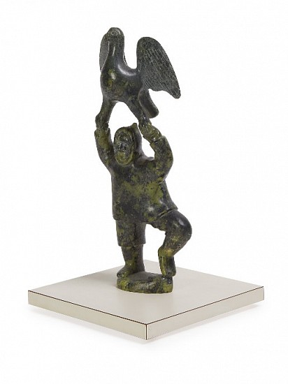 Abraham Etungat, Man catching bird
14 x 7 x 2 1/2 in.
This wonderful sculpture combines Etungat's two principal subjects -- birds and people.  The bird is almost a miniature bird of spring, Etungat's signature subject.  Both the bird and the man are animated, with the bird flapping its wings and the man captured in the act of jumping to grasp the bird.  The delicacy of the connection between the two is breathtaking.  The sculpture looks so natural that it's hard to overlook how daring the carving is.
03527-2