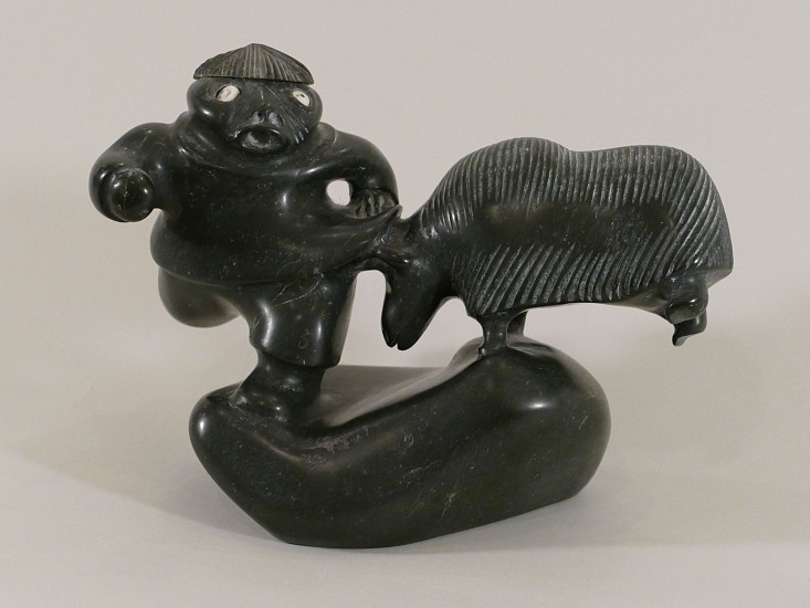 Judas Ullulaq, Musk ox attacking hunter, c. 1980
7 x 9 x 5 1/2 in.
This small but dynamic carving by Judas Ullulaq shows a musk ox attacking a hunter. The hunter is clearly terrified and running for his life. As is common in Inuit sculpture, the artist has disregarded the relative sizes of men and musk oxen. The carving is precise, and the emotion is unmistakable.
03578-1